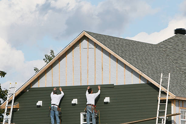 Professional Siding technician working in Greenville, NY
